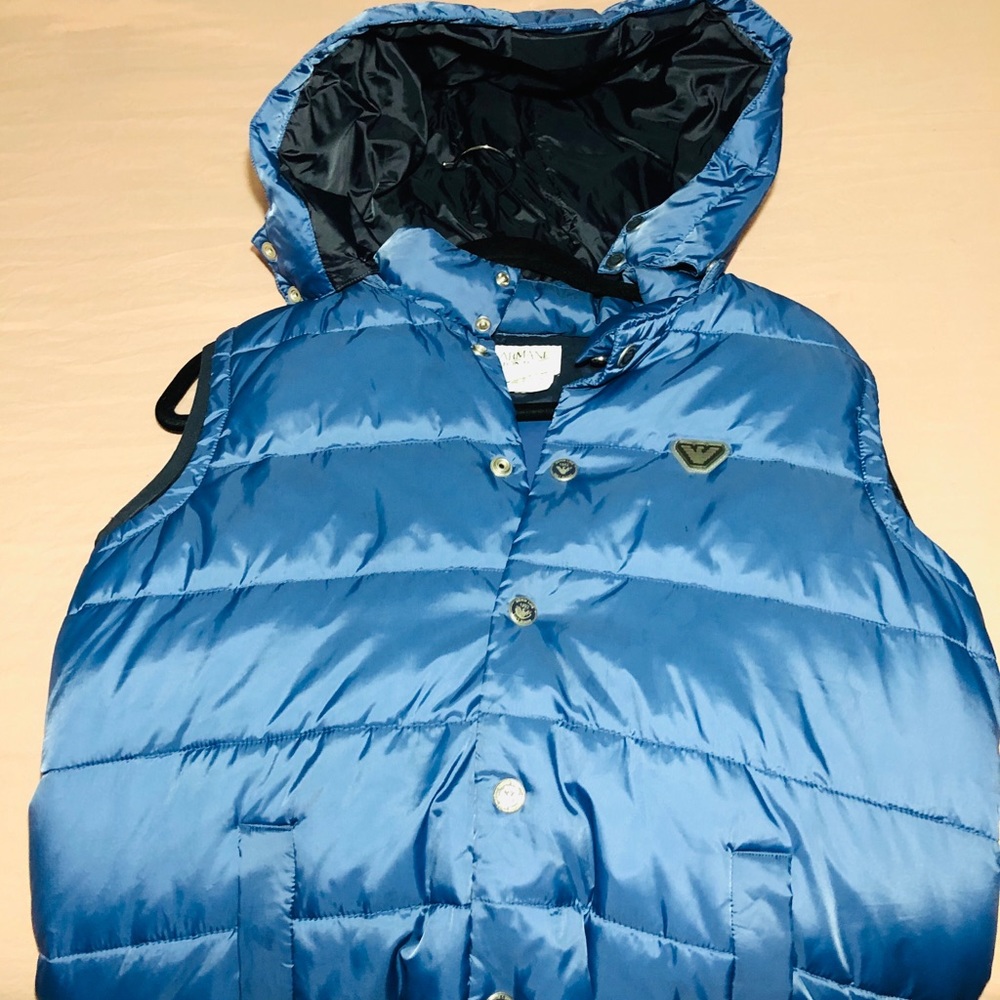 Armani sleeveless jacket.